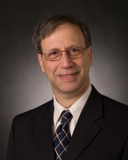 head and shoulder image of Andrew Zydney with dark background 