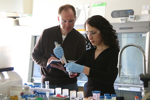 Huda Jerri and Darrell Velegol in a brightly lit lab