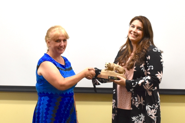 Photo of Dawn Mcfadden giving Katherine Gawel award